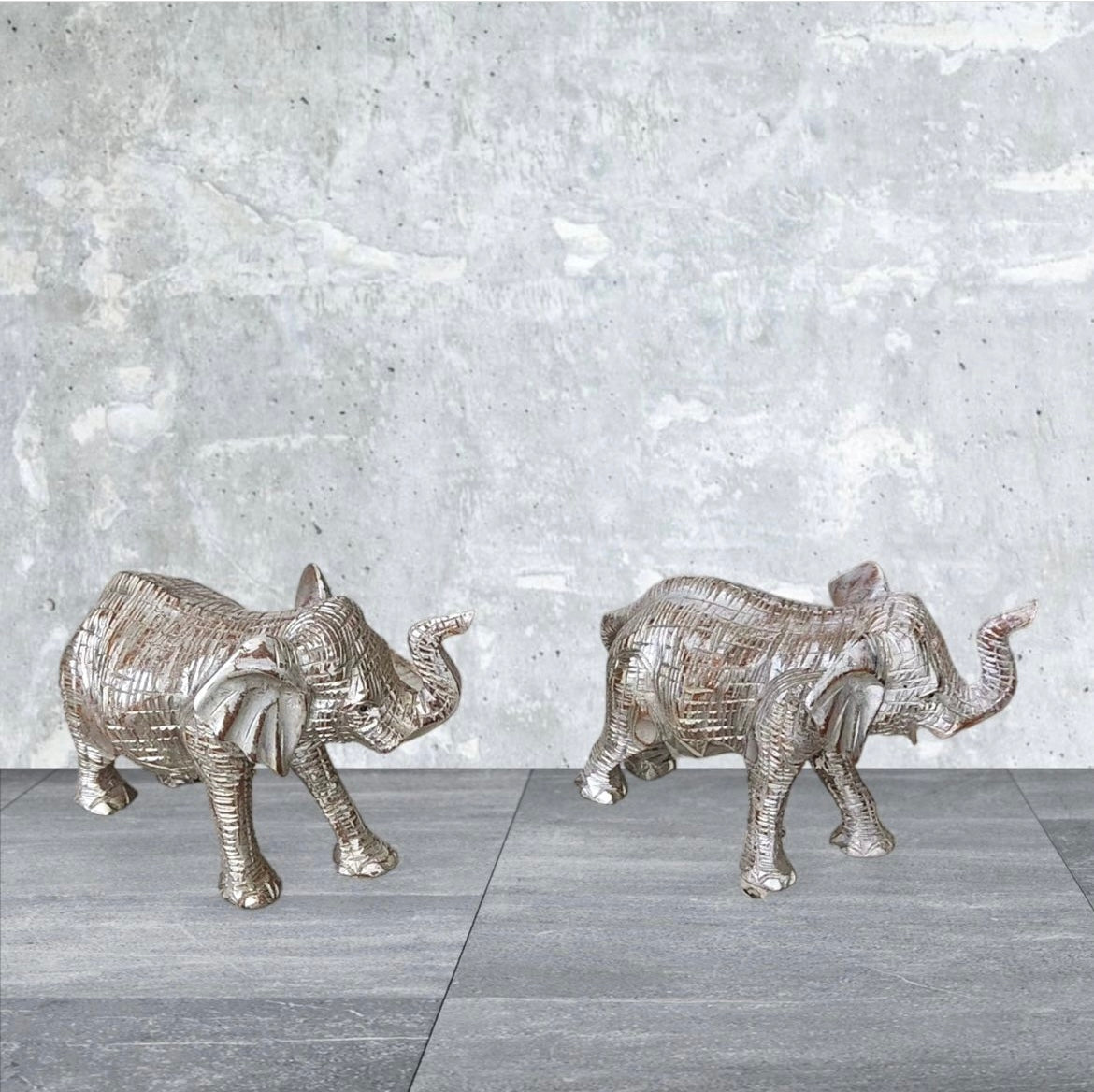 Silver Charm: Hand-Carved Rustic Wooden Elephant