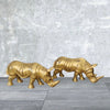 Golden Guardian: Hand-Carved Rustic Wooden Rhinoceros