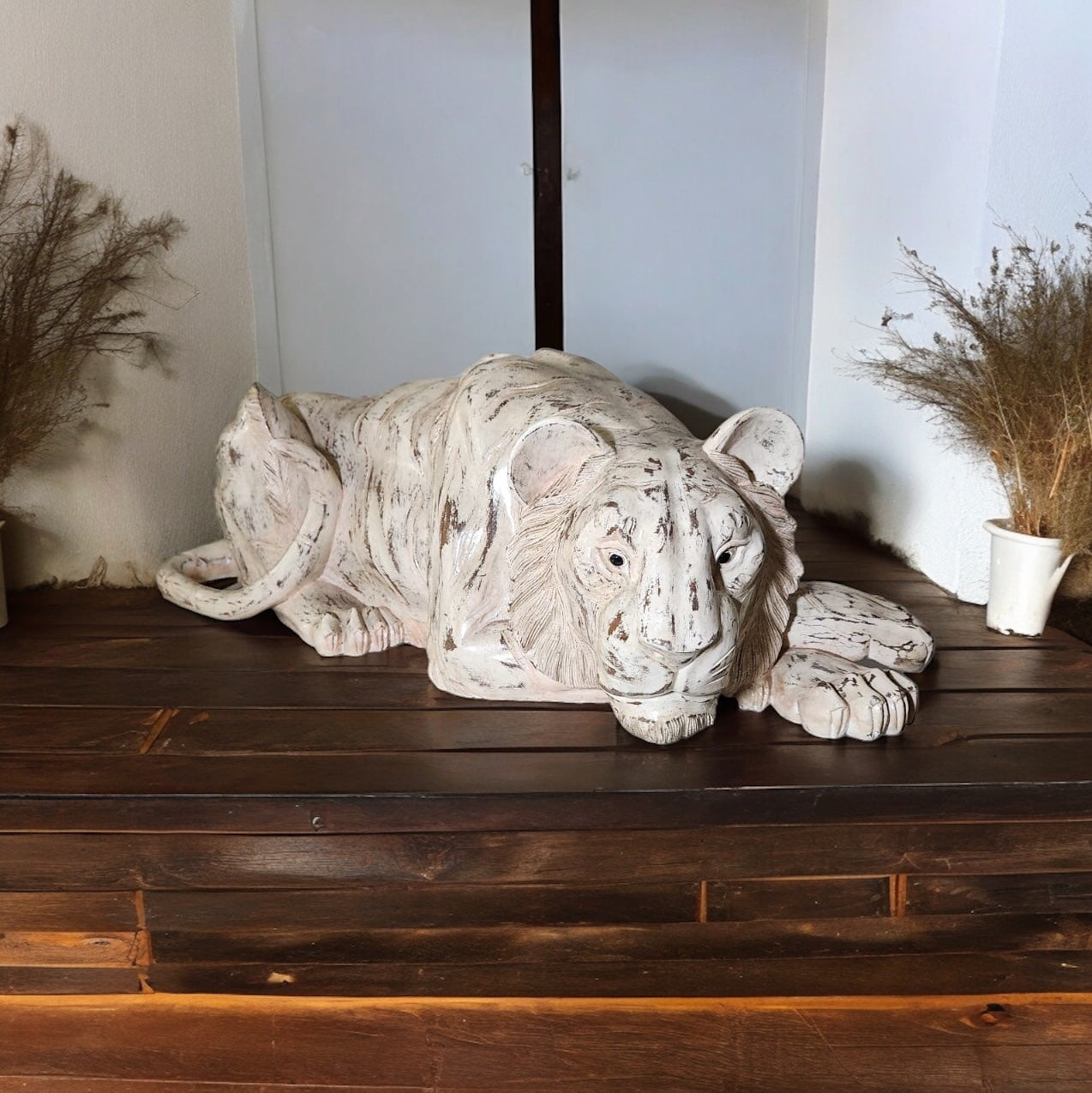 Regal Repose: Hand-Carved Rustic Wooden Lion